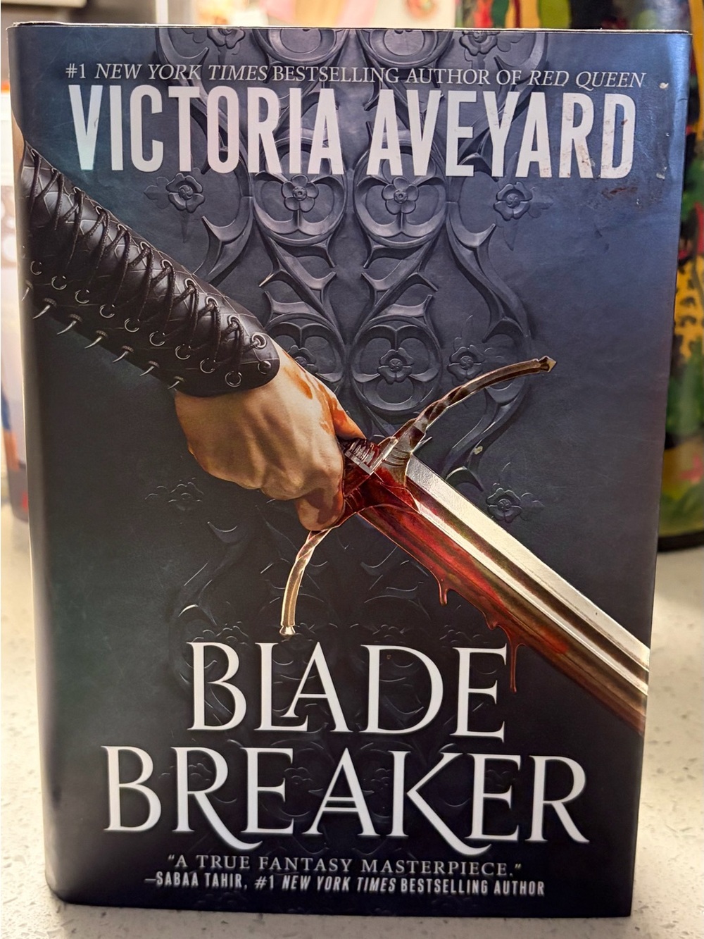 Blade Breaker by Victoria Aveyard - Dark Blue Cover with Red Accents
